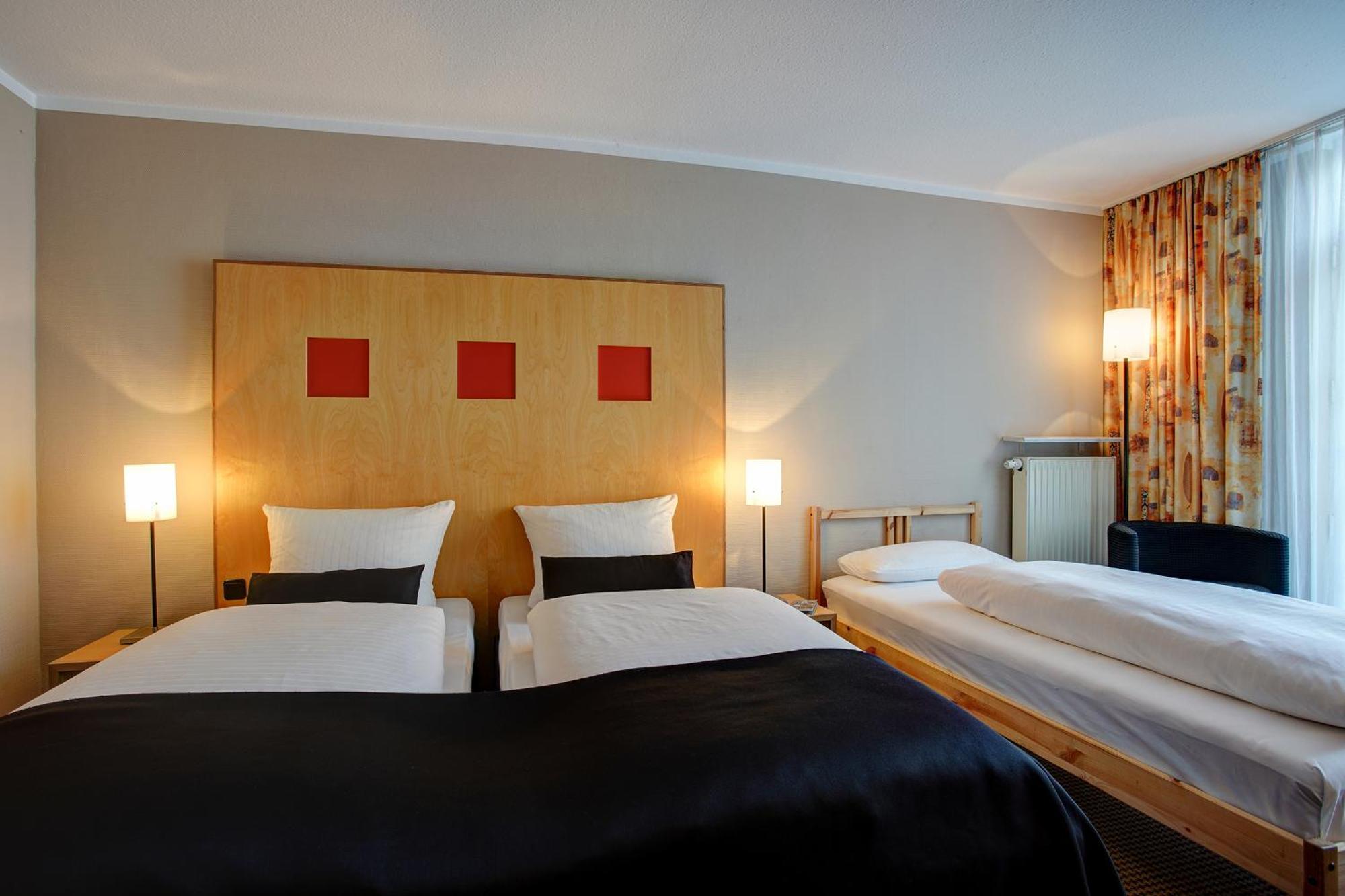 Family Room with One Double Bed and One Single Bed,1211668282:JPEG