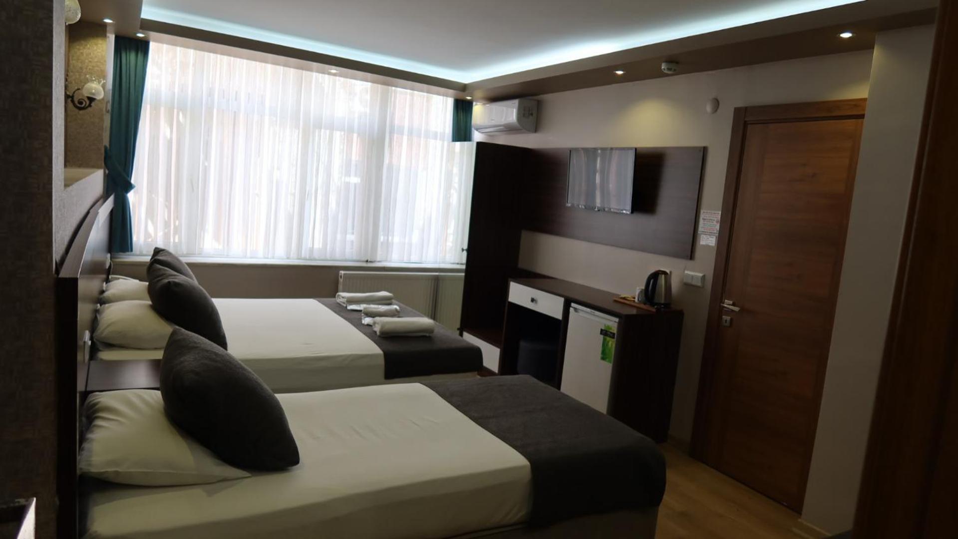 Deluxe Dreibettzimmer