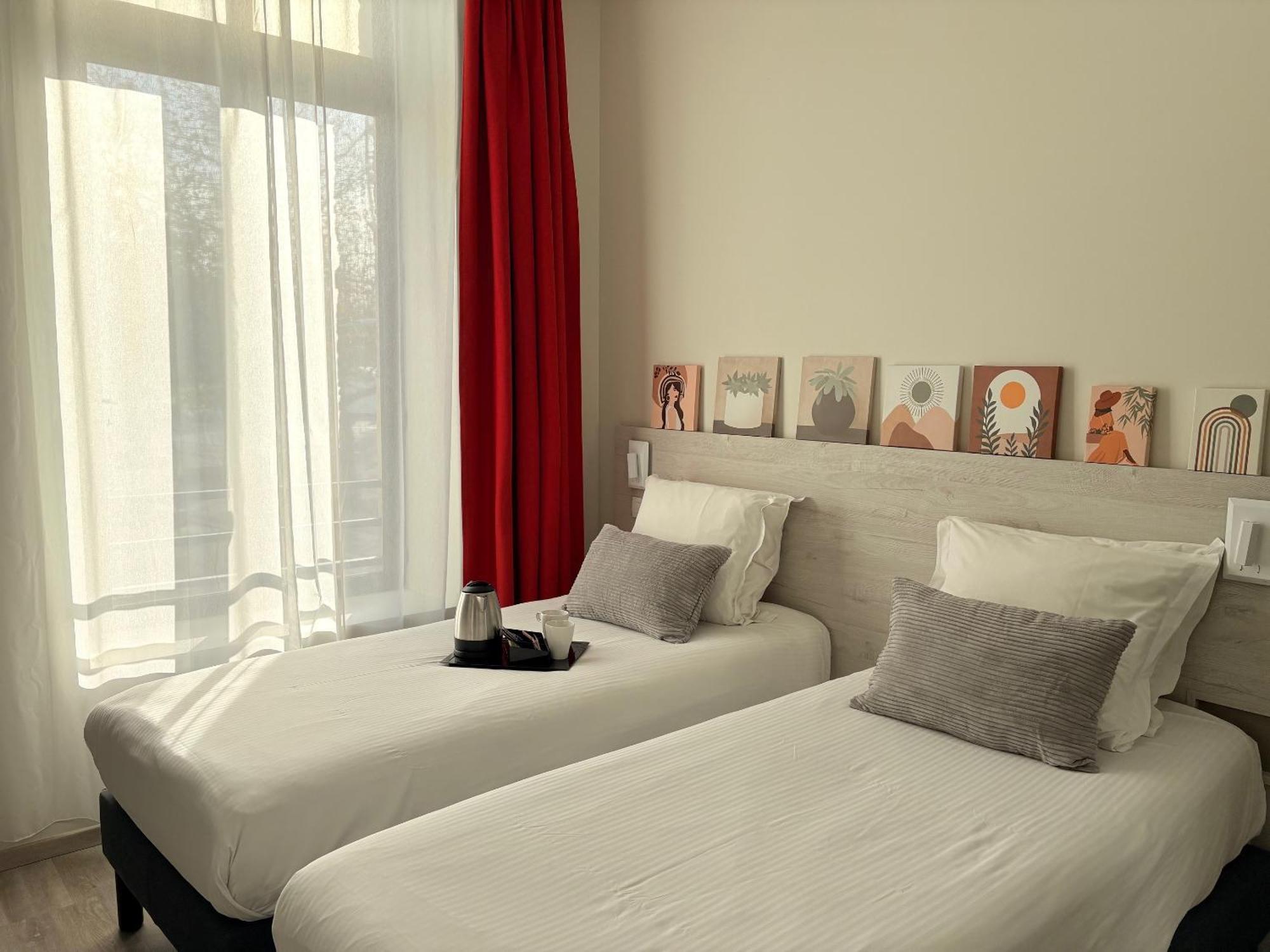 Tweepersoonskamer met 2 Aparte Bedden