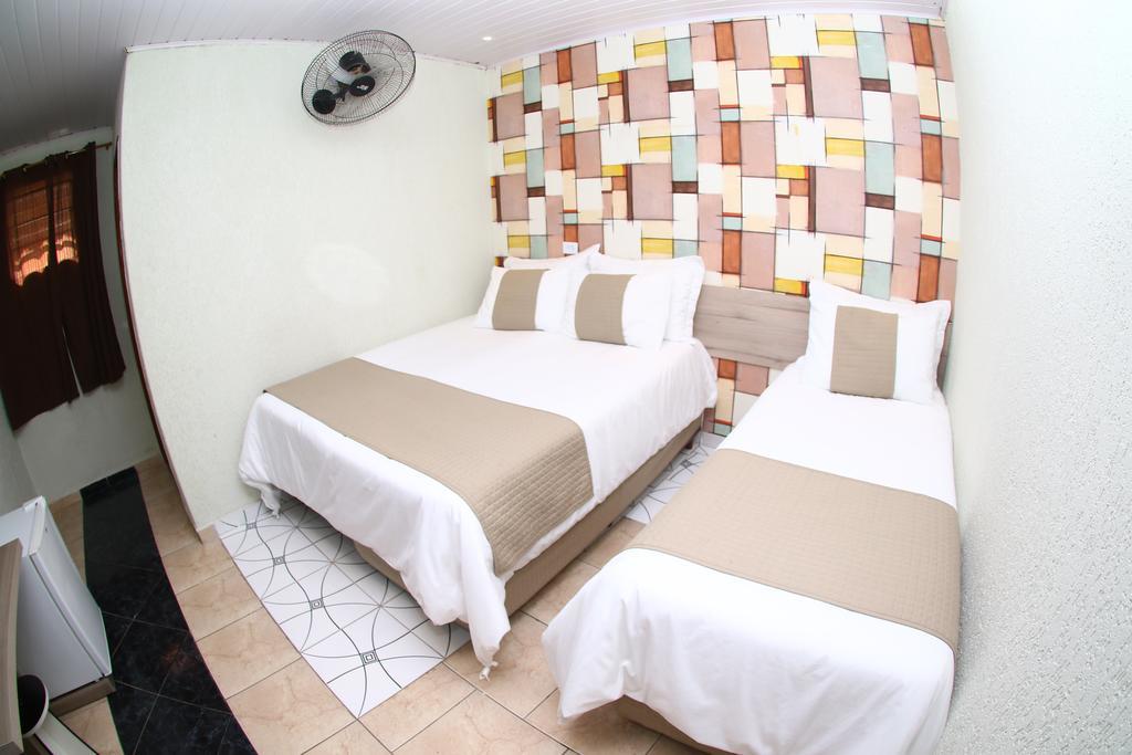 Quarto Triplo Executivo