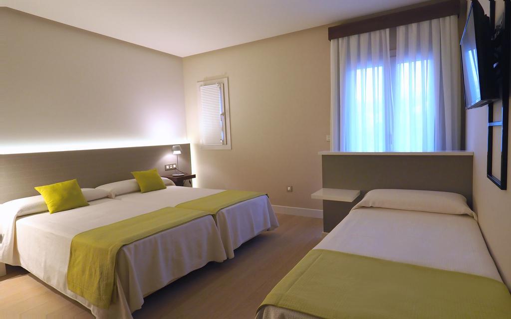 Habitación Triple con balcón