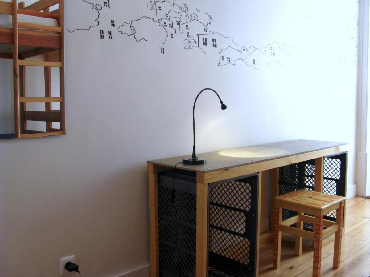 Cama en habitación compartida con 4 camas