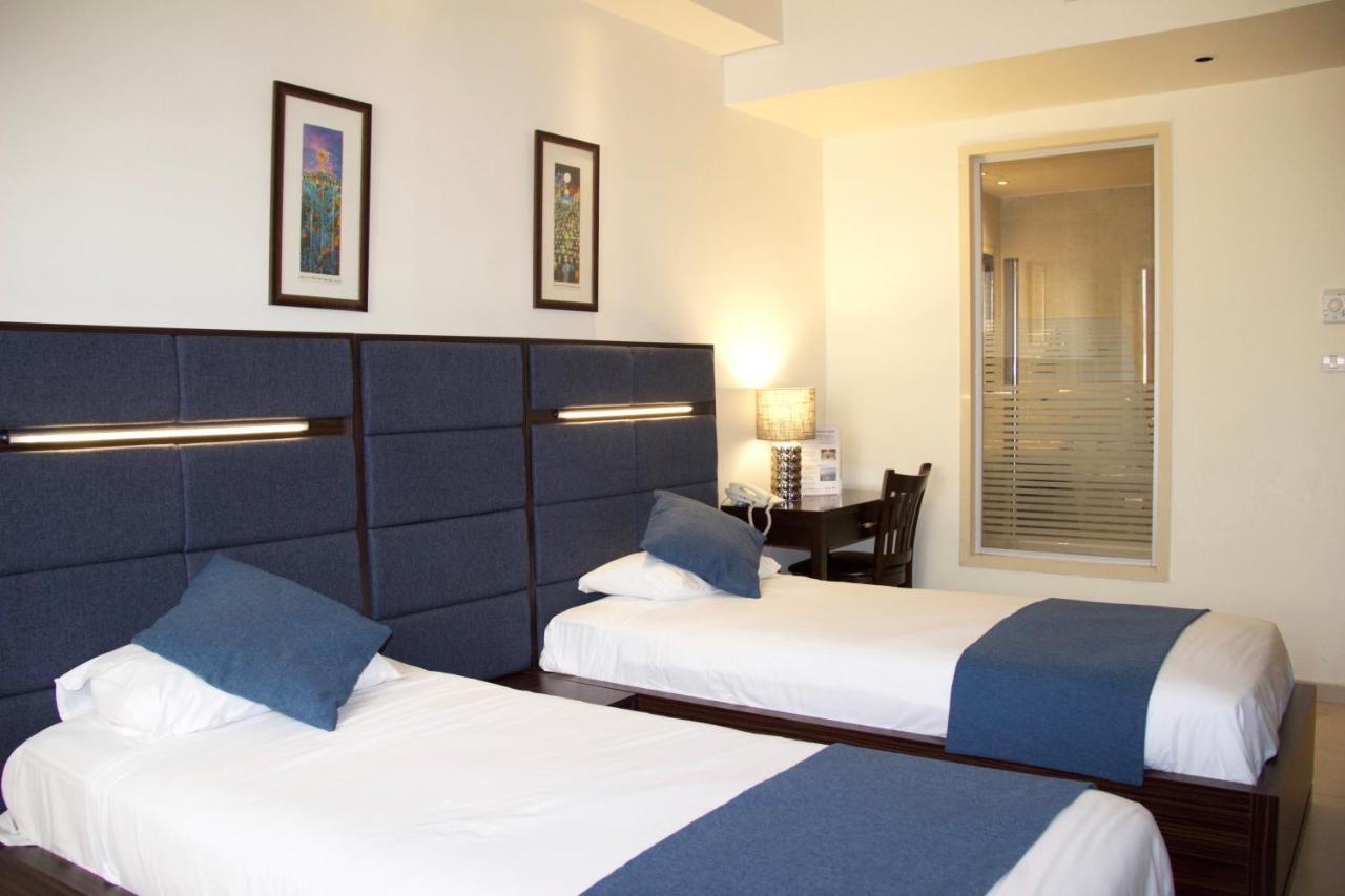 Quarto Deluxe com 2 Camas de Solteiro